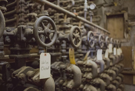 Decommissioned equipment in Hollingbery historic warehouse